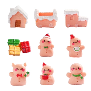 Set of 9 mini Christmas gingerbread man resin figurines with snowy house and holiday decor
