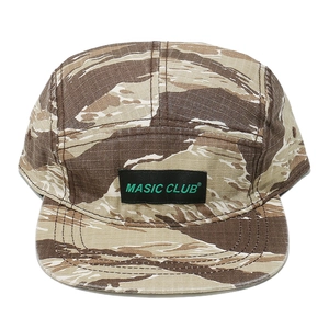 Detail of tiger stripe camouflage 5-panel camper hat featuring a green MASIC CLUB logo patch