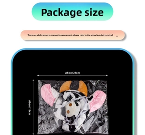 Detail view of plush cow ear headband in transparent packaging with size measurements