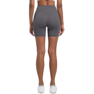 Rear view of grey high-waisted yoga shorts showing V-shape stitching and body-shaping fit