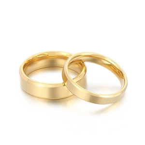 Polished gold stainless steel rings set for couples featuring wide and narrow mirror bands