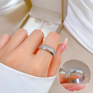 Minimalist silver frosted titanium steel ring with a textured matte finish for men and women