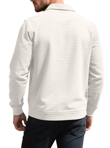 Detail of men's cream waffle knit long sleeve polo shirt showing back view and texture