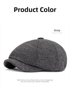Macro detail of dark grey herringbone tweed newsboy hat with textured wool finish