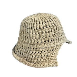 Women's hollow-out knit bucket hat in beige with breathable back-slit design