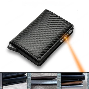 Detail of RFID carbon fiber card holder showing side laser engraving for personalization