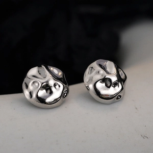 Irregular textured S925 sterling silver stud earrings with minimalist wrinkled finish