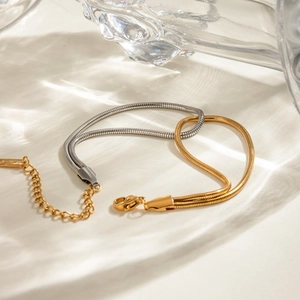 Two-tone gold and silver stainless steel snake chain bracelet with lobster clasp