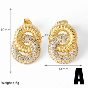 Detail of 19x14mm gold-plated zircon earrings with layered cross-radiant textures