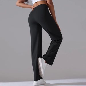 Rear view of high waisted wide leg black yoga pants with drawstring and side pockets