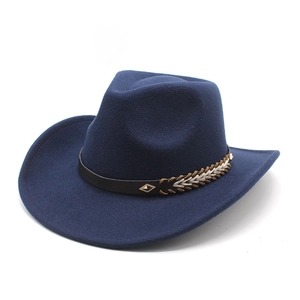Detailed close-up of dark blue felt cowboy hat with leather band and metal buckle