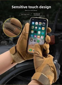 Tactical gloves detail showing sensitive two-finger touchscreen capability on smartphone