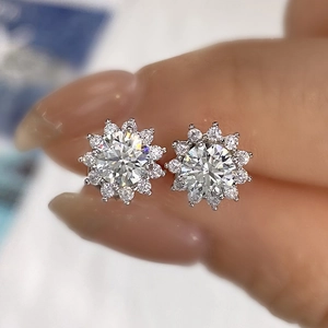 Macro shot of 925 silver moissanite stud earrings featuring classic sunflower halo design