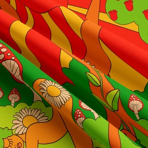 Close-up of retro psychedelic fabric featuring colorful mushroom and daisy floral patterns