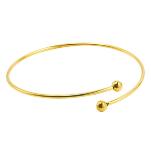 Detailed top view of a polished gold titanium steel open bangle with double spherical ends