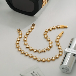 Gold-plated stainless steel tennis bracelet set with heart and round cubic zirconia stones