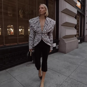 Women zebra print structured blazer set with deep V-neckline for urban fashion style