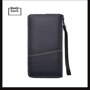 Detail view of black leather wallet back featuring contrast stitching and wrist strap