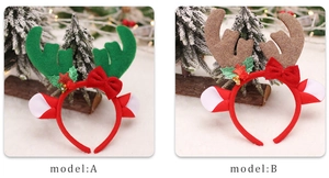 Detail of reindeer antler headbands with sequins, holly leaves and golden bells decor