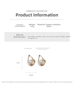 Detail view of twisted gold hoop earrings with pearl showing 2cm height and 1.5cm width