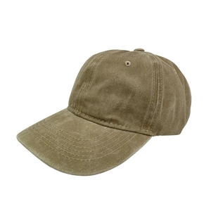 Detail view of khaki washed cotton baseball cap with vintage distressed texture and stitching
