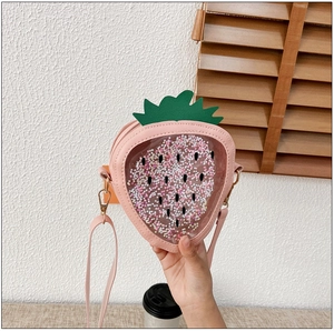 Detail of pink strawberry jelly bag featuring glitter sequins and a clear PVC window