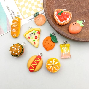 Set of 10 assorted resin food charms including bread, pizza, and orange with metal rings