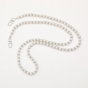 Elegant long white pearl phone strap with sparkling silver rhinestone rings and metal clasps
