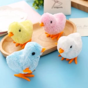 Set of four colorful plush wind-up chickens in yellow, pink, blue, and white colors