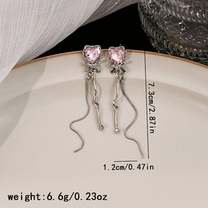 Detail of pink heart crystal tassel earrings with size measurements 7.3cm x 1.2cm