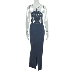Front detail of black halter neck maxi dress with slim fit and side slit on invisible mannequin