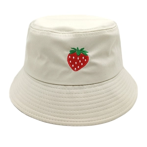 Classic cream cotton bucket hat featuring a delicate embroidered strawberry graphic on the front