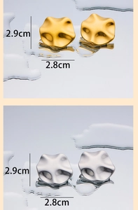 Detailed view of wave-textured earrings in gold and silver showing 2.9cm x 2.8cm dimensions