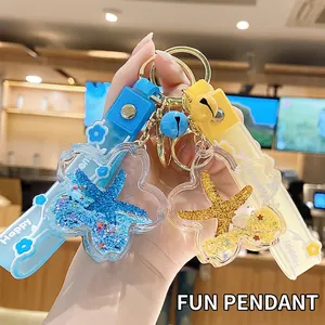 Creative marine life quicksand keychain featuring floating starfish in liquid acrylic