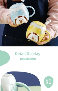 Detail of creative ceramic mugs with 3D animal relief and matching lids and spoons