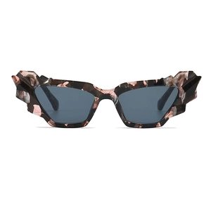 Trendy irregular cat eye sunglasses with crystal geometric texture in pink floral finish