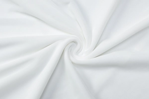 Close-up of white mesh fabric texture showing soft draping and high breathability detail