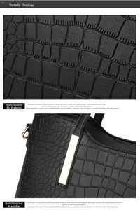 Detail of premium black crocodile pattern PU leather and golden hardware on the handbag