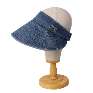 Blue denim wide brim sun visor hat with metallic butterfly emblem for women