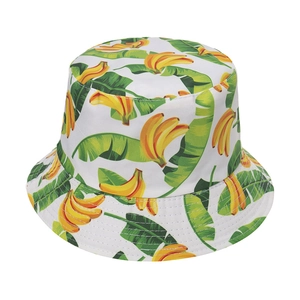 Unisex white bucket hat featuring tropical yellow banana and green leaf print patterns