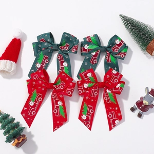 Barrettes à cheveux de Noël avec imprimés Père Noël et nœuds festifs en ruban