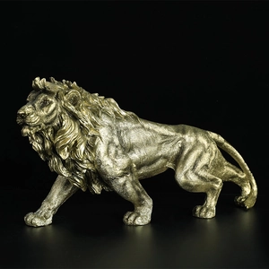 Regal golden lion statue in walking pose for home and office luxury decor