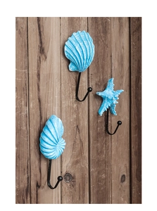 Detailed view of Mediterranean nautical starfish and shell resin wall hooks in blue