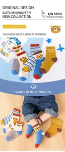 Detailed view of five pairs of cotton tiger themed crew socks for kids in various colors