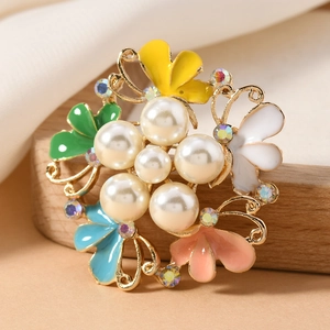 Exquisite gold flower brooch with colorful enamel petals and sparkling rhinestones