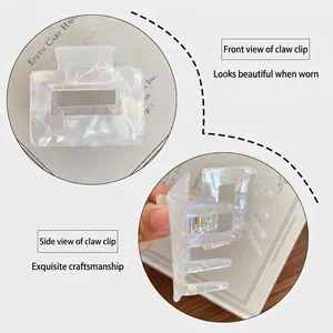 Iridescent pearlescent rectangle hair claw clip with holographic mermaid shell finish