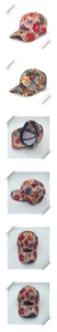 Detail view of floral baseball cap showing embroidery, inner mesh, and metal buckle