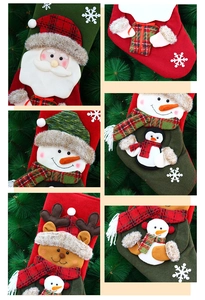 Detail of 6 pack plush Christmas stockings with Santa, Snowman and Reindeer patterns