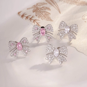 Exquisite silver butterfly stud earrings set with zircon micro-pave and pink center gems