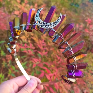 Detail of purple iridescent crystal crown with silver moon charms on wire-wrapped headband